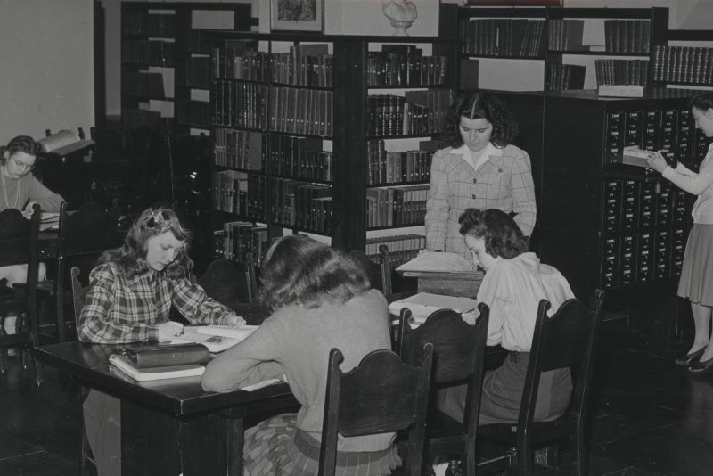 students in St. Kate's Library with card catalog, 1940